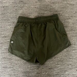 Green athletic shorts all in motion